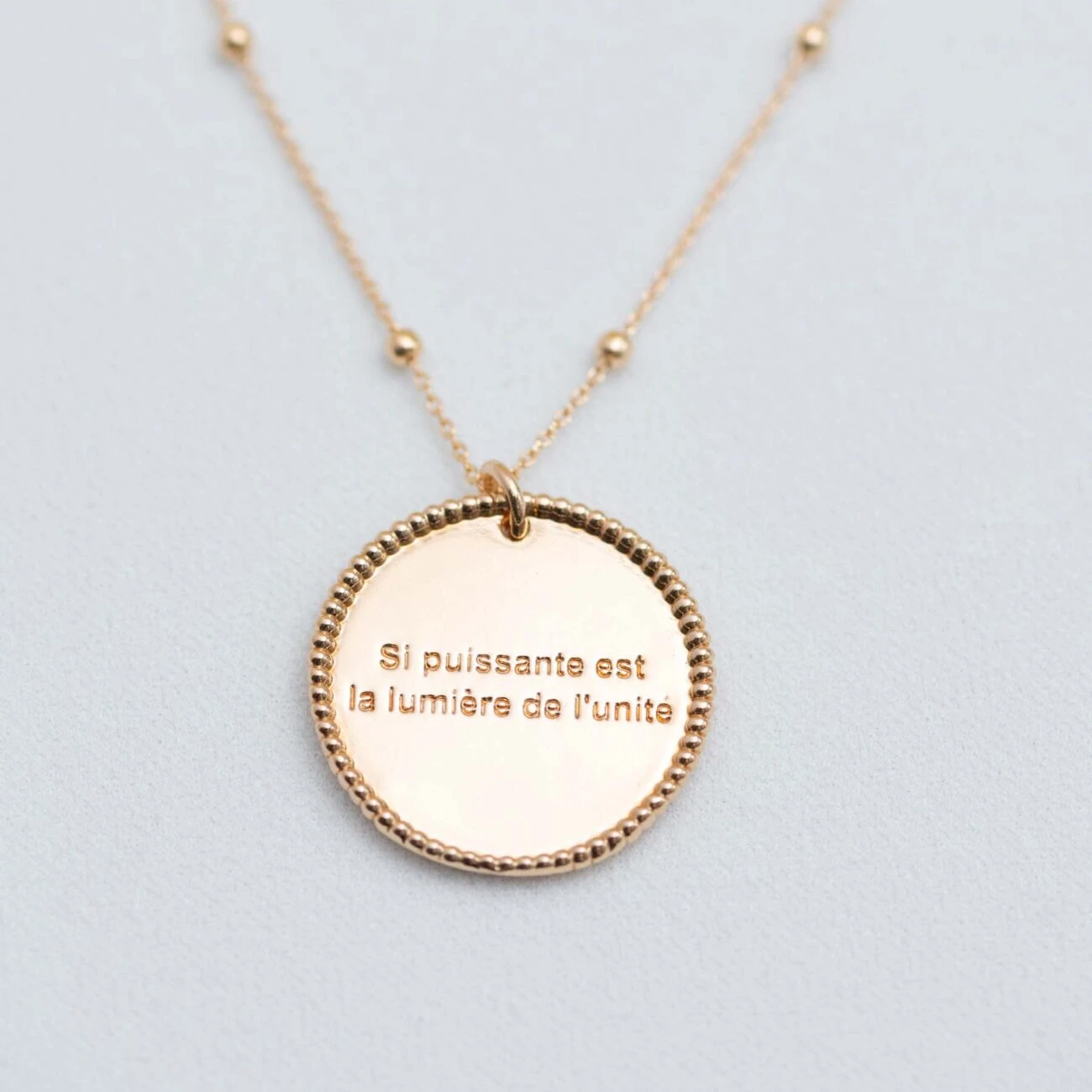 bijoux bahai si. puissante est la lumière de l'unité