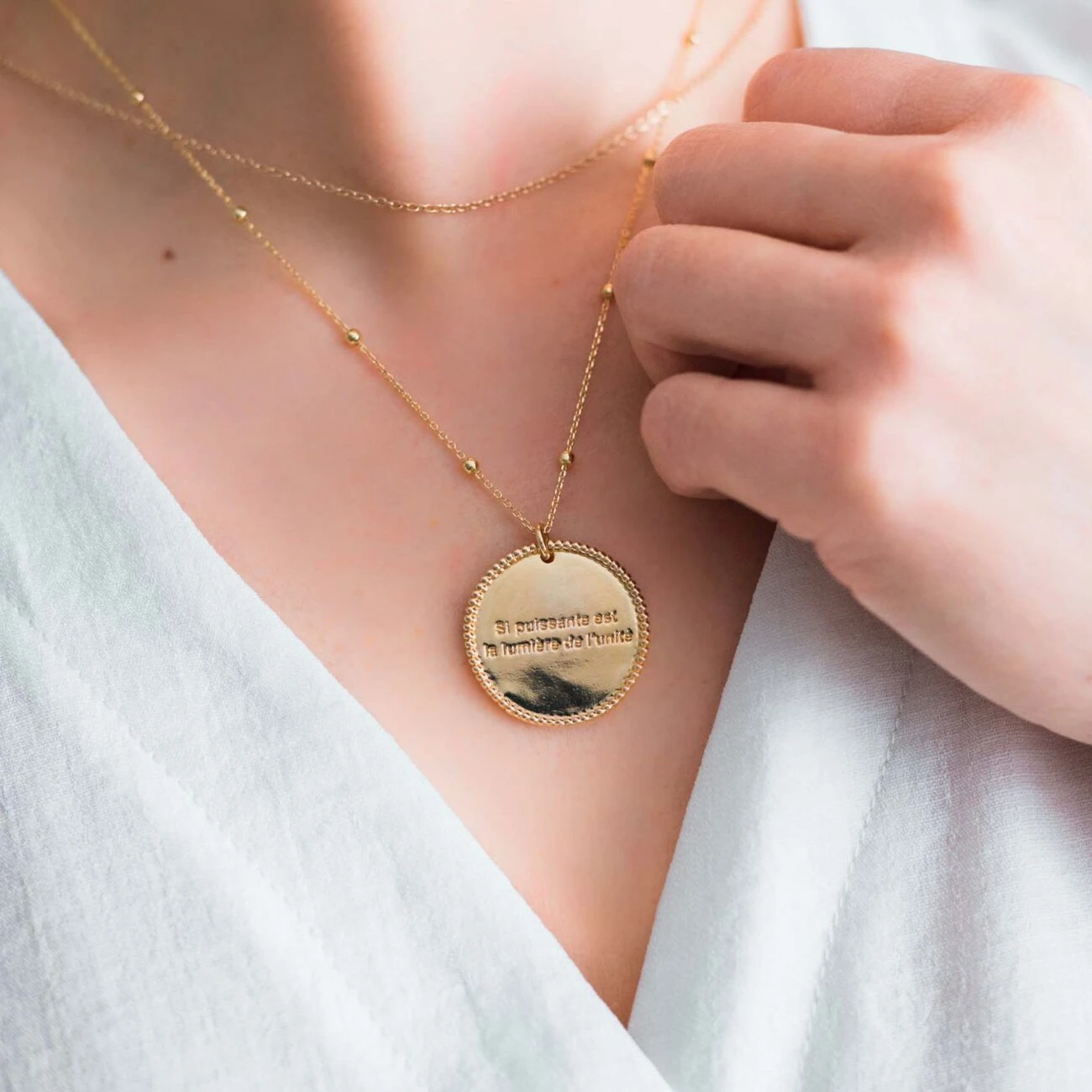 bijoux bahai si. puissante est la lumière de l'unité